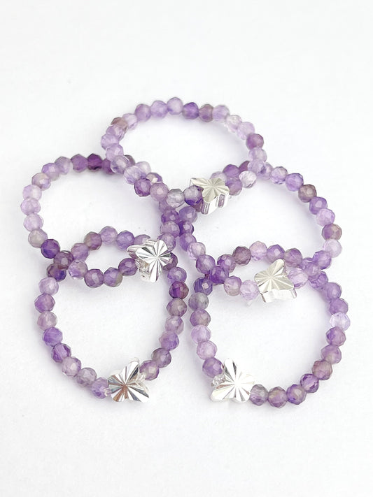 Ring av ametystperler